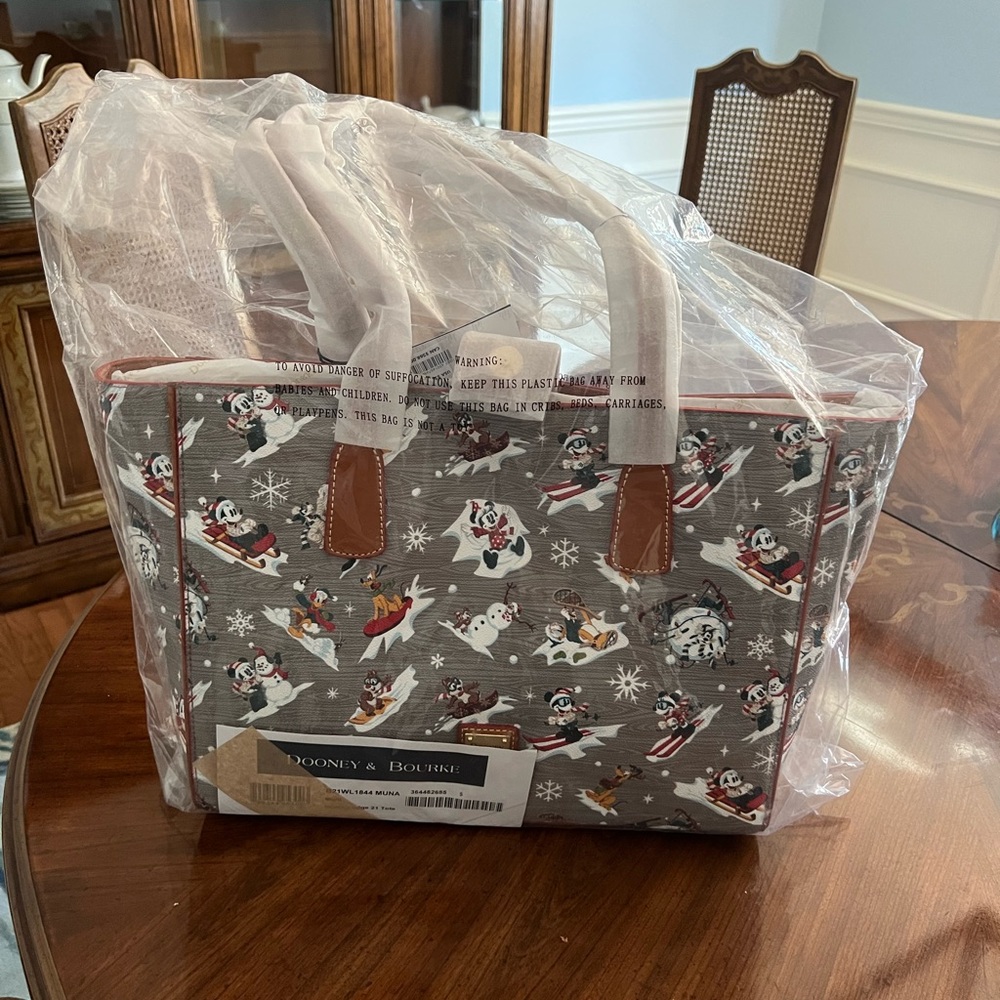 Disney Christmas Dooney and Burke. NWT